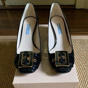 Black patent leather Prada 2” block heel pumps